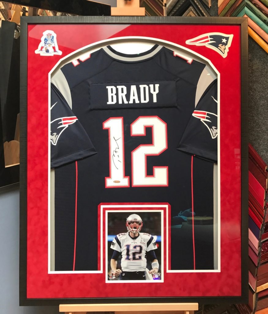 Blue Tom Brady signed Jersey Framed by Jacquez Art